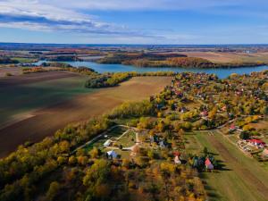 an aerial view of a village next to a river at Non stop apartman 2 in Kaposvár