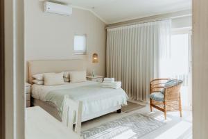 Ένα ή περισσότερα κρεβάτια σε δωμάτιο στο Lilla's Landing