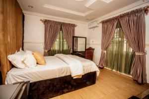 Ένα ή περισσότερα κρεβάτια σε δωμάτιο στο A Luxury 3 bedroom bungalow