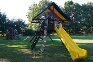 a playground with a kite on a slide at Sarzana-Charming Apartment Pool and BB in Sarzana
