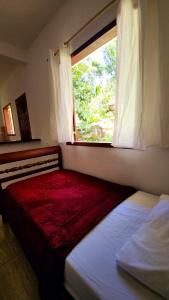 Ένα ή περισσότερα κρεβάτια σε δωμάτιο στο Casa Flora +7 φωτογραφίες