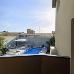Swimmingpoolen hos eller tæt på Charming studio in an elegant residence in Catania