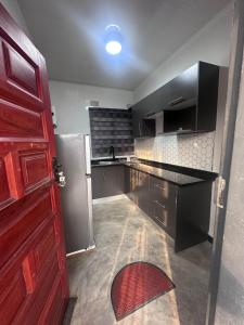 Kuchyň nebo kuchyňský kout v ubytování Zango Apartments