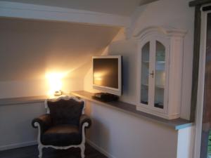 Μια τηλεόραση ή/και κέντρο ψυχαγωγίας στο Gite de charme de Langeanat Grenoble