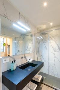 Koupelna v ubytování Hotel Settefiori