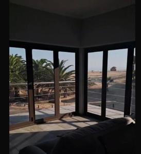 Ένα ή περισσότερα κρεβάτια σε δωμάτιο στο Langstrand house