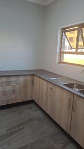 Η κουζίνα ή μικρή κουζίνα στο Langstrand house