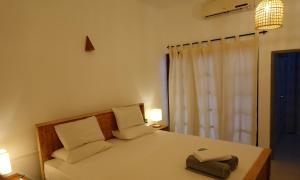 Postel nebo postele na pokoji v ubytování jackie´s guest house