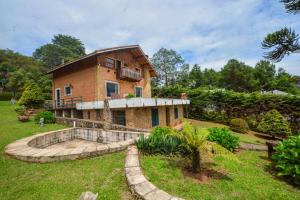 En have udenfor Charmosa Casa Familia