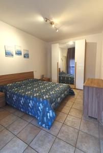 En eller flere senge i et værelse på Stella Maris Family Home