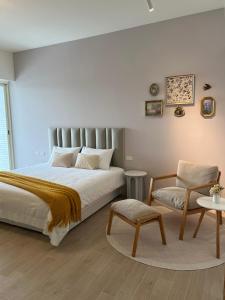 Postel nebo postele na pokoji v ubytování 靜沐森林 + 10 fotografií