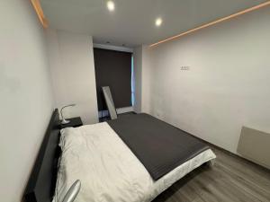 Postel nebo postele na pokoji v ubytování Immodelpas Pessons