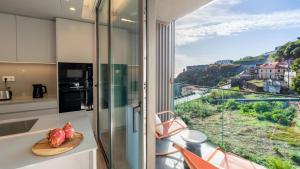 Kuchyň nebo kuchyňský kout v ubytování Orion Calheta Hills by LovelyStay