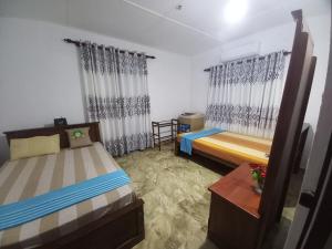 Ένα ή περισσότερα κρεβάτια σε δωμάτιο στο No-37 Home