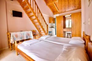 Ένα ή περισσότερα κρεβάτια σε δωμάτιο στο Xi Village