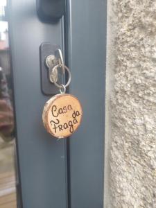 Et logo, certifikat, skilt eller en pris der bliver vist frem på Casa da Fraga + 9 billeder