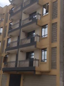 a building with balconies on the side of it at HERIJ Staycation kitengela in Kitengela 