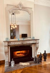 TV a/nebo společenská místnost v ubytování Villa Merma + 48 fotografií