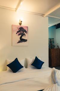 Postel nebo postele na pokoji v ubytování Coorg Saturn Homes