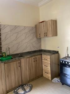 Kuchyň nebo kuchyňský kout v ubytování Benny rose apartment