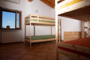 Postel nebo postele na pokoji v ubytování Villa Fortuna - villa 12 posti con piscina + 42 fotografií