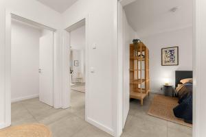 Postel nebo postele na pokoji v ubytování Oase im Herzen der Stadt