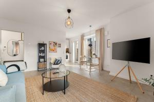 TV a/nebo společenská místnost v ubytování Oase im Herzen der Stadt