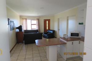 Η κουζίνα ή μικρή κουζίνα στο Eden Park Townhouse Complex