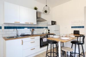 Η κουζίνα ή μικρή κουζίνα στο L'Antique - Au pied du Théâtre - 1 à 4 pers - Wifi