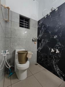 Koupelna v ubytování Shamak Homestay Varkala