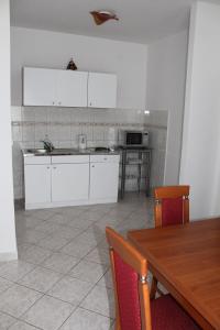Η κουζίνα ή μικρή κουζίνα στο Apartment Mila
