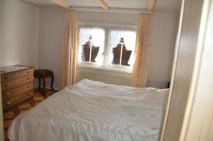 Ένα ή περισσότερα κρεβάτια σε δωμάτιο στο Breiten