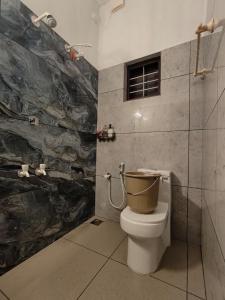 Koupelna v ubytování Shamak Homestay Varkala