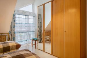 Postel nebo postele na pokoji v ubytování Mühlerain