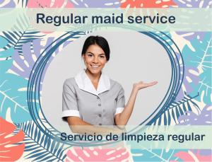 a woman in a mirror with the text regular market service at Condo very close beach in Punta Cana