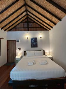 Ένα ή περισσότερα κρεβάτια σε δωμάτιο στο Coco Valley Koh Tao +58 φωτογραφίες