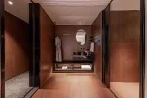 Koupelna v ubytování Wuyun Guanshan Yue Designer Hotel + 108 fotografií