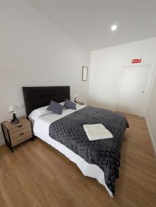 Кровать или кровати в номере Apartmento Canguro