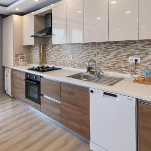 Kuchyň nebo kuchyňský kout v ubytování On4 Rooms & Suites + 7 fotografií