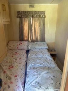 Postel nebo postele na pokoji v ubytování KC Caravans