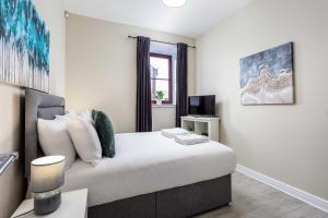 Televiisor ja/või meelelahutuskeskus majutusasutuses Granary Suite No3 - Donnini Apartments