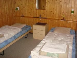 Ένα ή περισσότερα κρεβάτια σε δωμάτιο στο Chalet Bärli