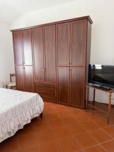 Postel nebo postele na pokoji v ubytování Molinella Appartamento Amelia & Carlo