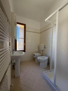 Koupelna v ubytování Molinella Appartamento Amelia & Carlo