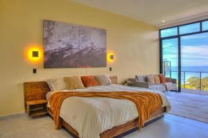 Ένα ή περισσότερα κρεβάτια σε δωμάτιο στο Casa Bliss