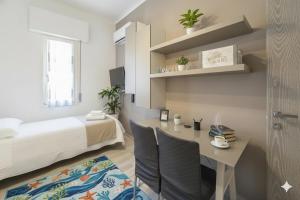 Ένα ή περισσότερα κρεβάτια σε δωμάτιο στο Maddalena Holiday House +6 φωτογραφίες