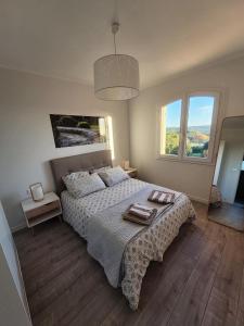 Voodi või voodid majutusasutuse Villa les seringas toas