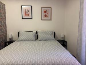 Ένα ή περισσότερα κρεβάτια σε δωμάτιο στο Casa Malvina