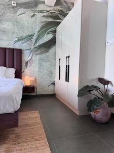 Ένα ή περισσότερα κρεβάτια σε δωμάτιο στο Turiya Retreat