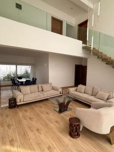 Χώρος καθιστικού στο L' Oasis marine +2 φωτογραφίες